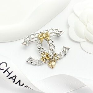 Elegant Silver and Gold Chain Brooch